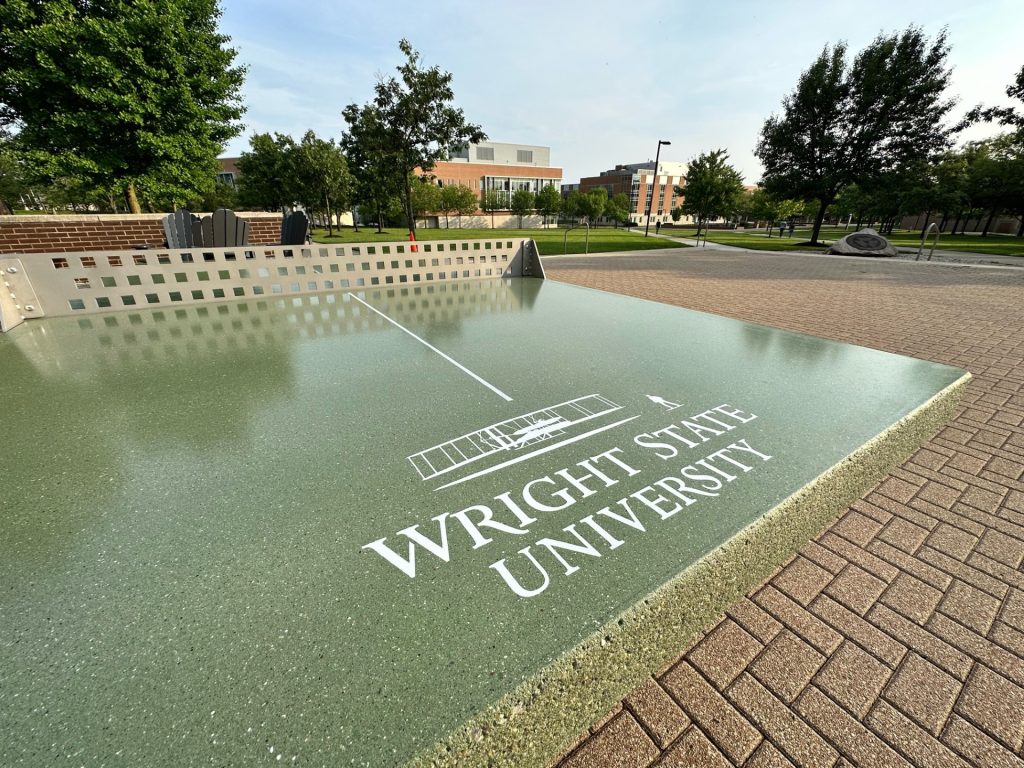 Wright State University Concrete Ping Pong Table close up of logo.